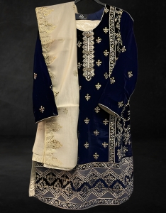 3 piece suit. Navy blue shirt with gold dupatta and trousers.