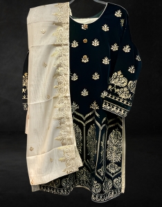 3 piece suit. Green velvet shirt with gold dupatta and trousers.