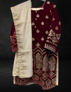 3 piece suit. Maroon velvet shirt with gold dupatta and trousers.