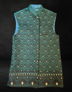 Kids waist coat. Green with black and gold embroidery.
